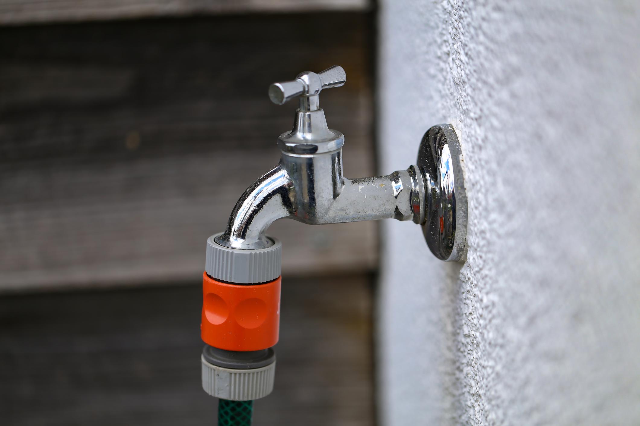 Outdoor spigot and garden hose